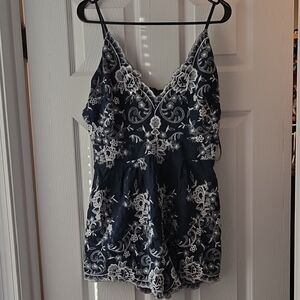 Navy Floral Embroidered Romper with White Lace Detail